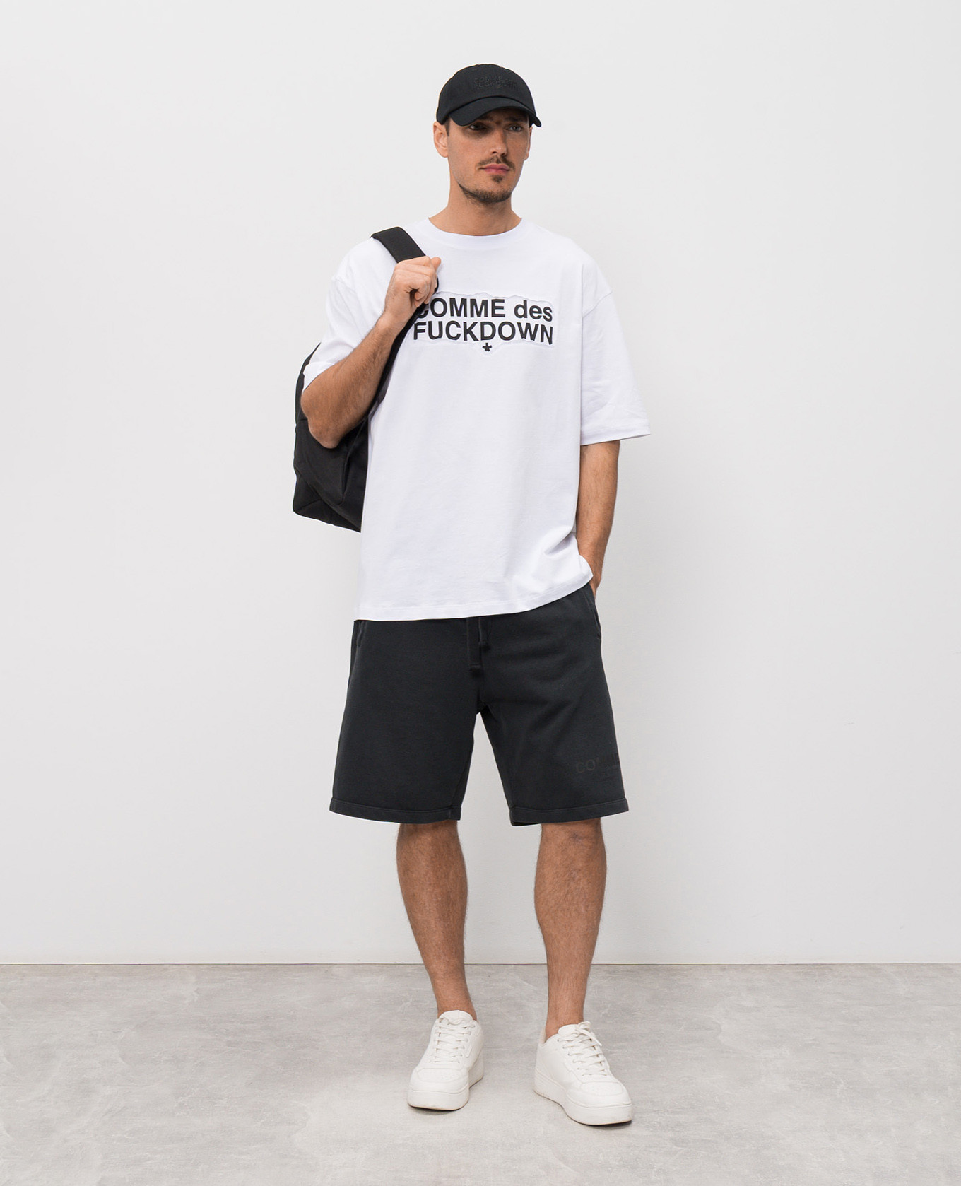 

White T-shirt with logo insert Comme des Fuckdown