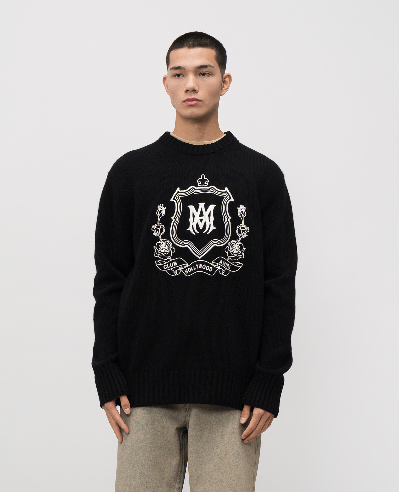 

Black wool sweater with logo AMIRI
