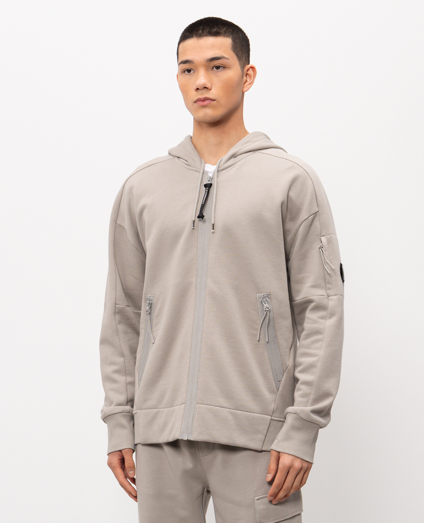 

Grey sports jacket with logo patch C.P. Company