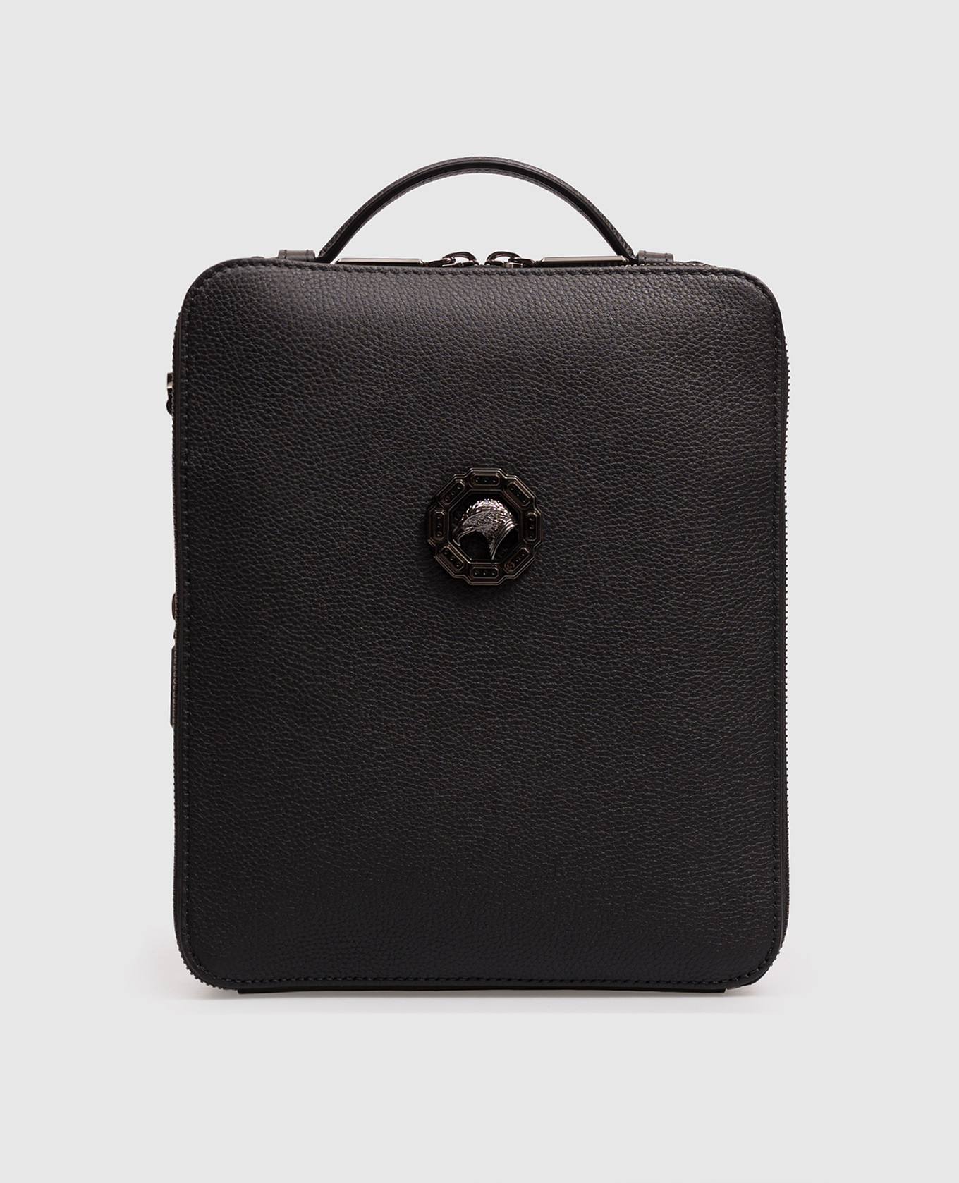 Black leather bag with textured emblem