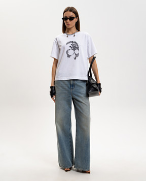 Alexander McQueen Blue jeans with a worn effect 848913QMAD0