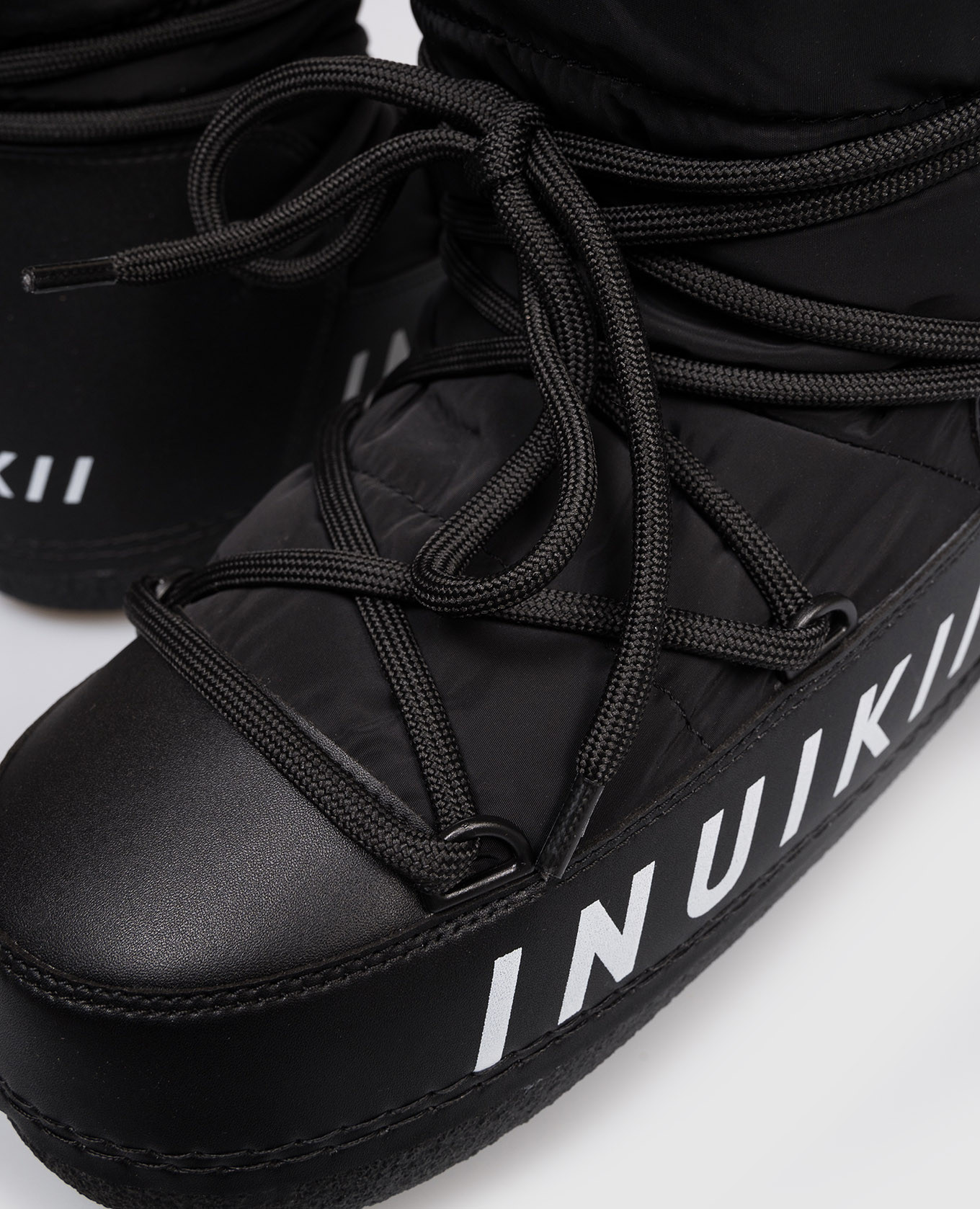 

Black combination boots with fur Inuikii