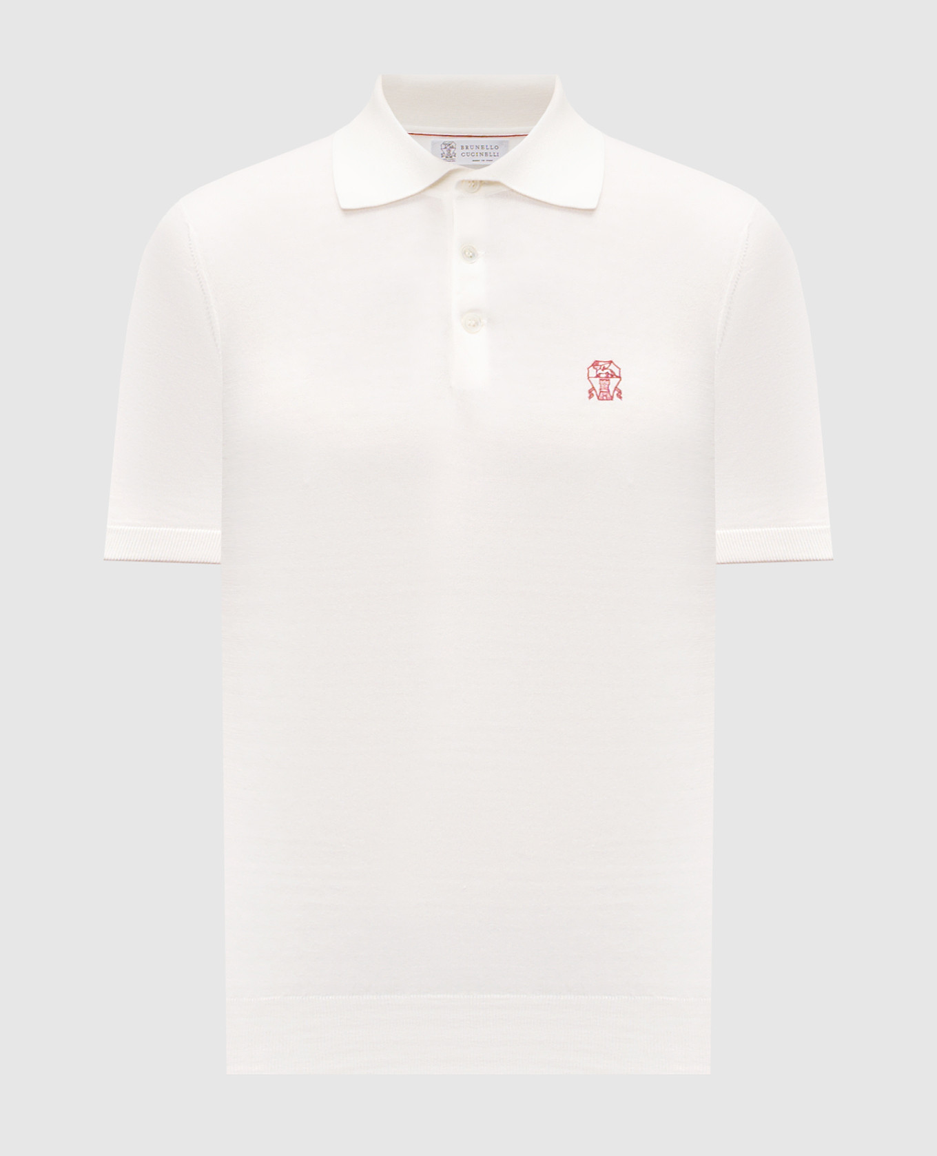 White polo shirt with emblem