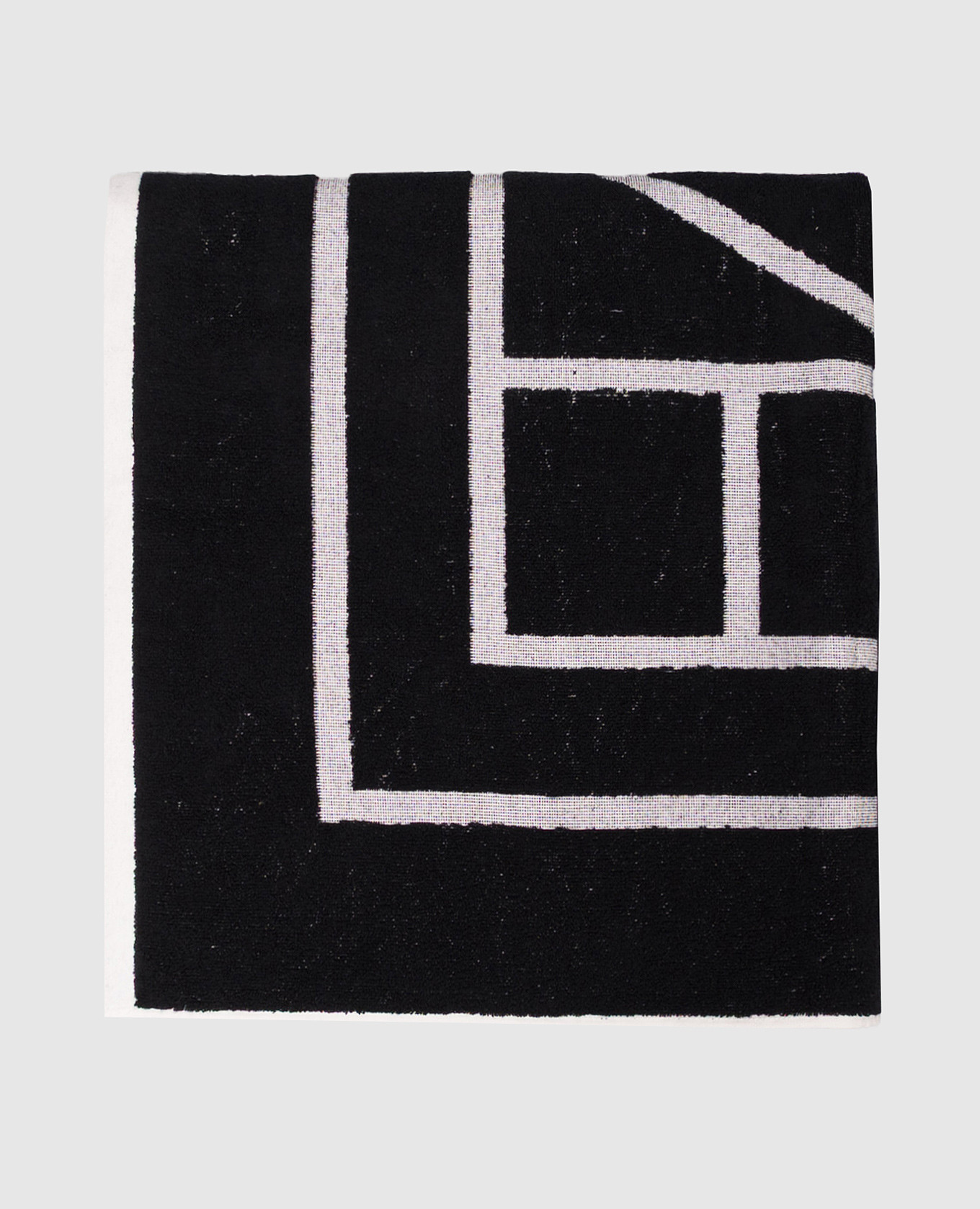 

Black terry towel with monogram logo pattern Toteme
