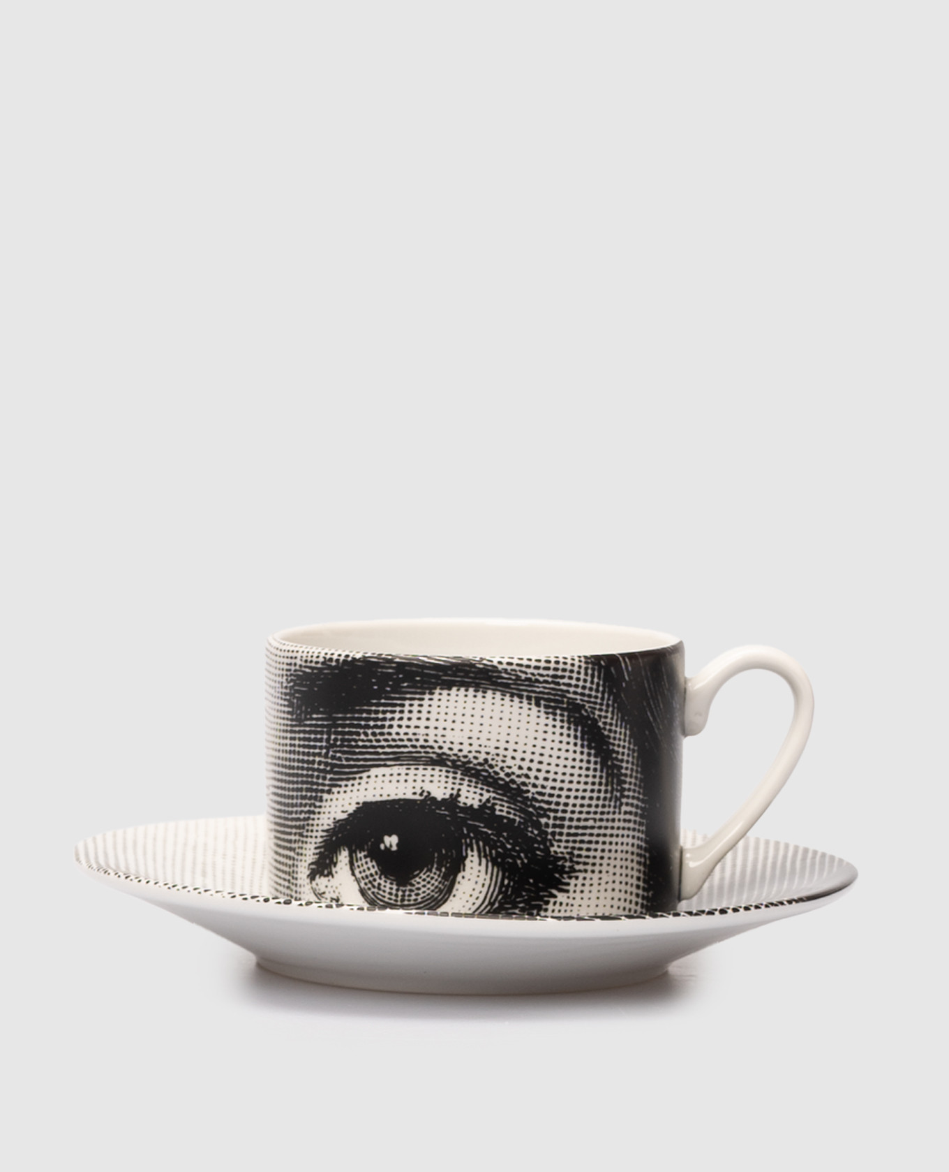 

Porcelain tea set Tema e Variazioni with cup and saucer Fornasetti, Black