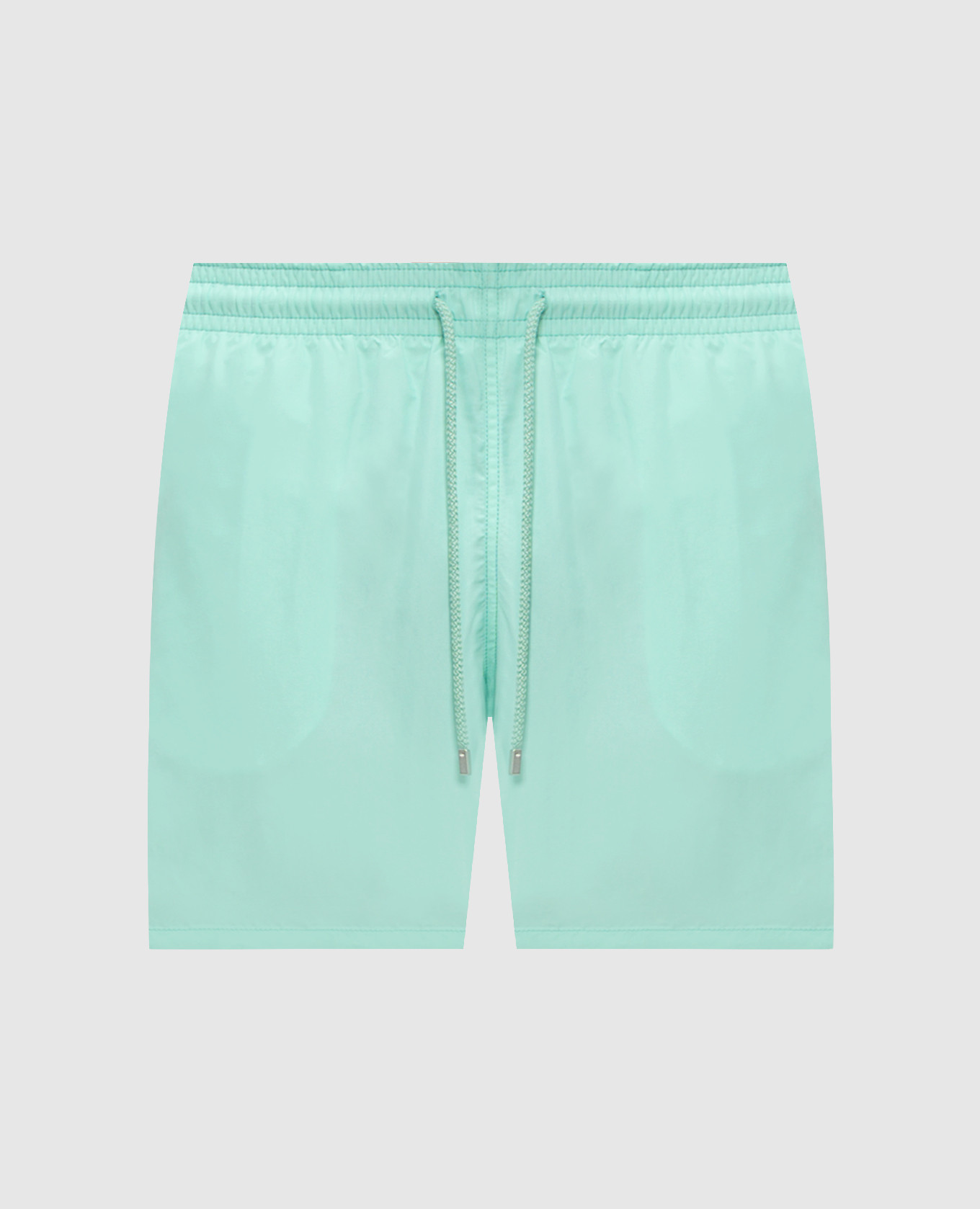 Green swim shorts with patch
