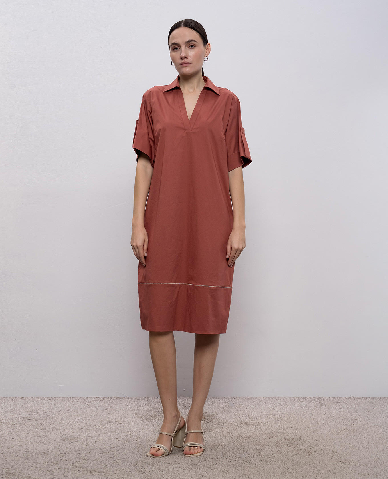 

Red dress with a monil chain Peserico