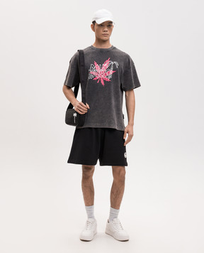 Palm Angels Black shorts with logo patch PMCI019S26FLE003