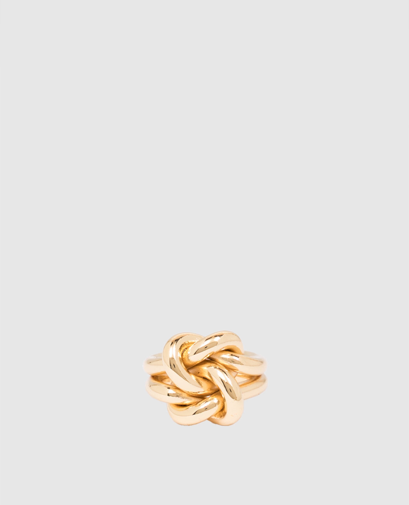

Golden ring with textured knot Reco