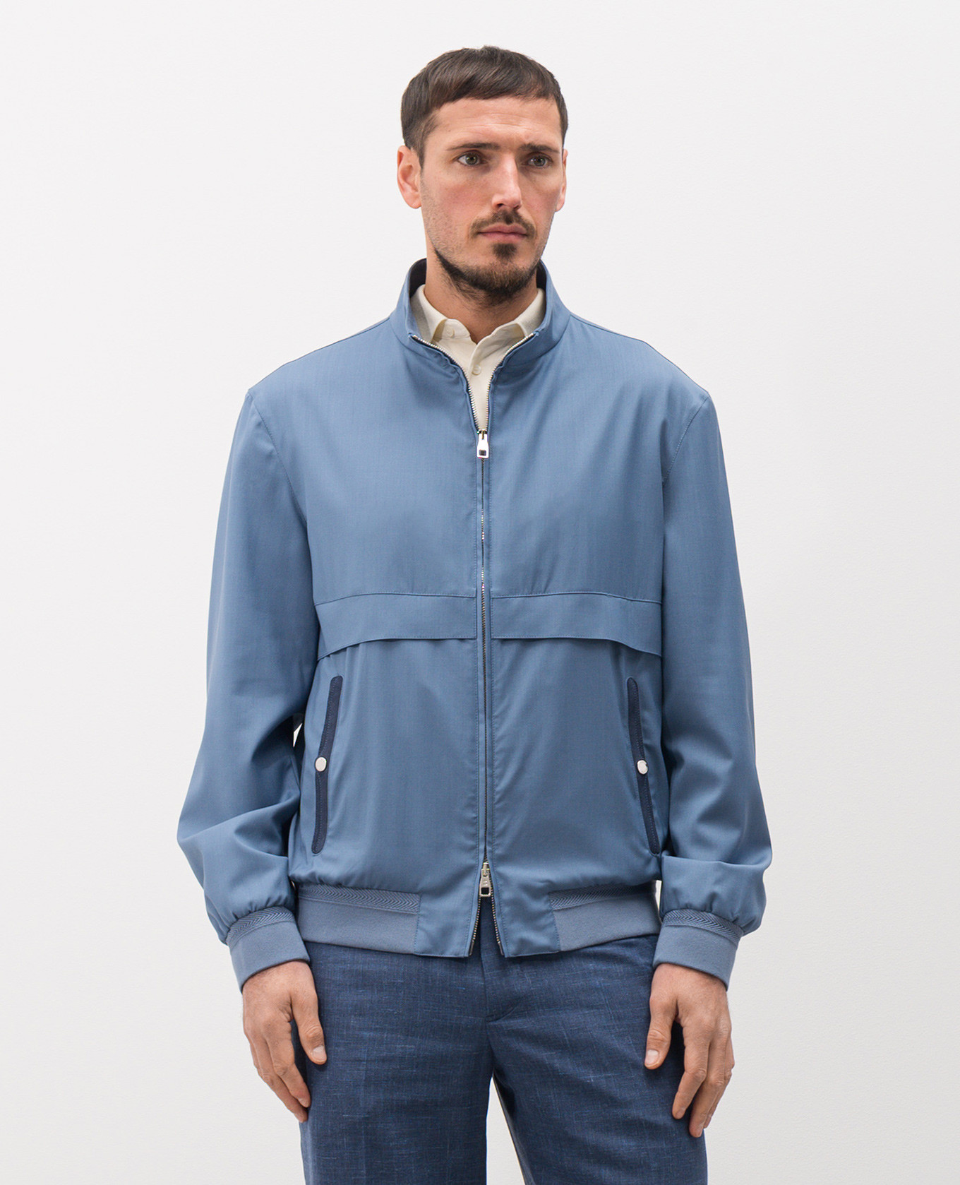 

Blue wool jacket with emblem Brett Johnson