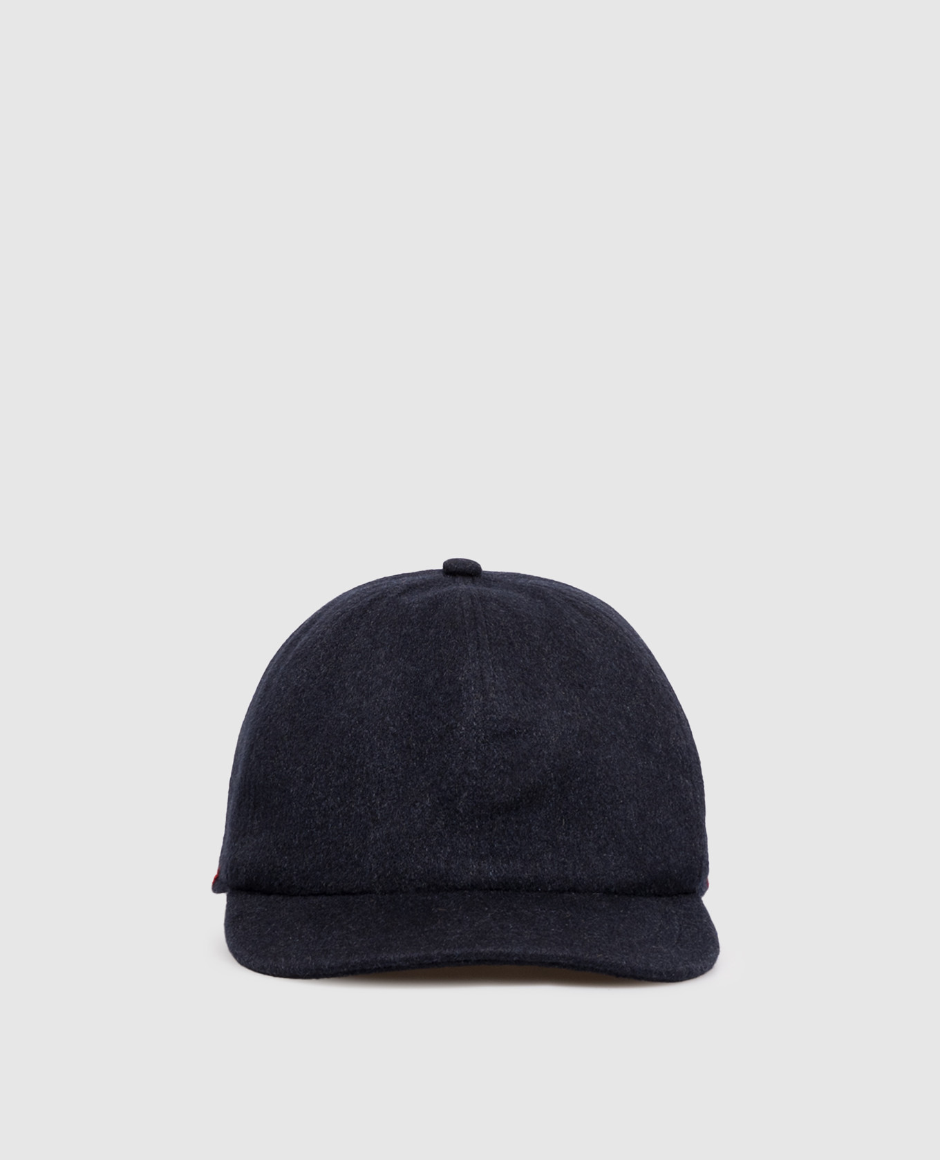 Blue cashmere cap with embroidered emblem