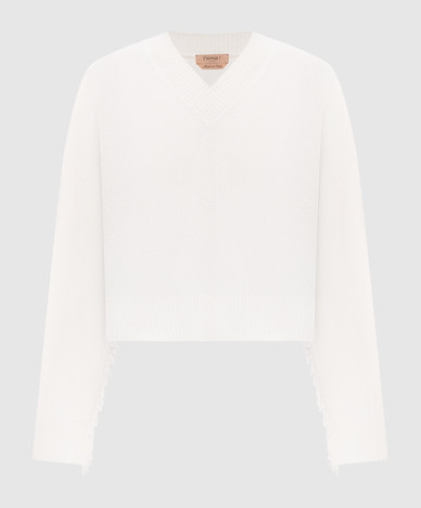 Ivory sweater with fringe