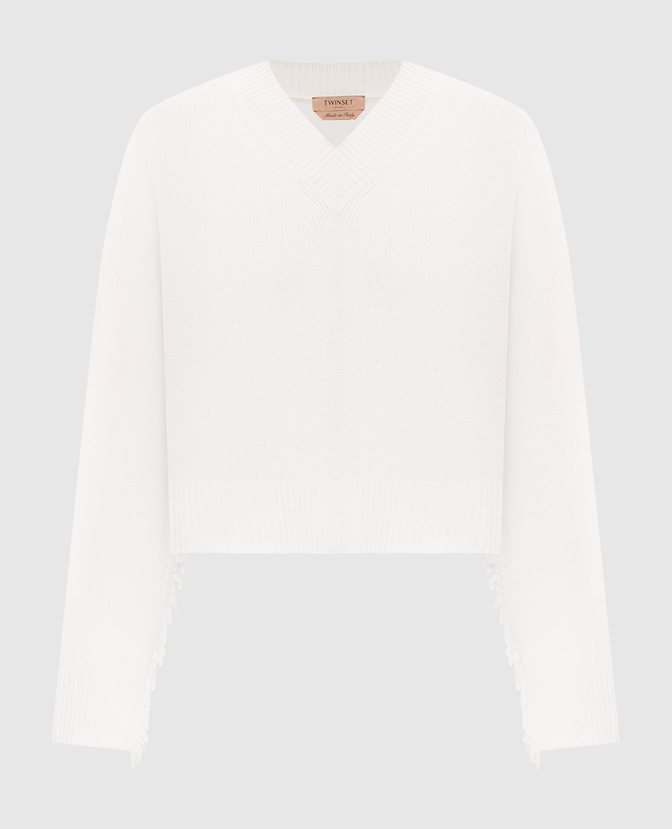 Ivory sweater with fringe