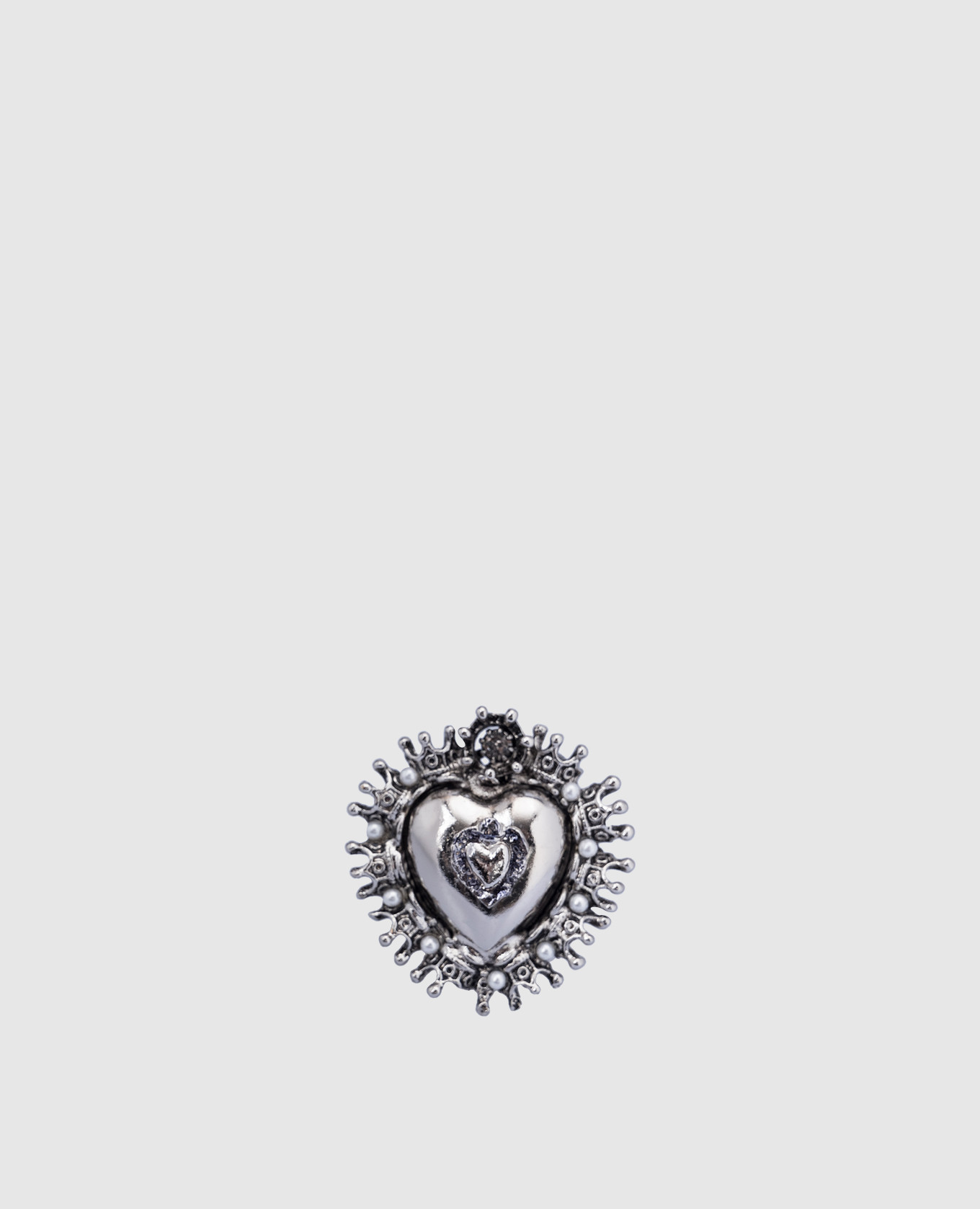 Silver heart-shaped ring with beads