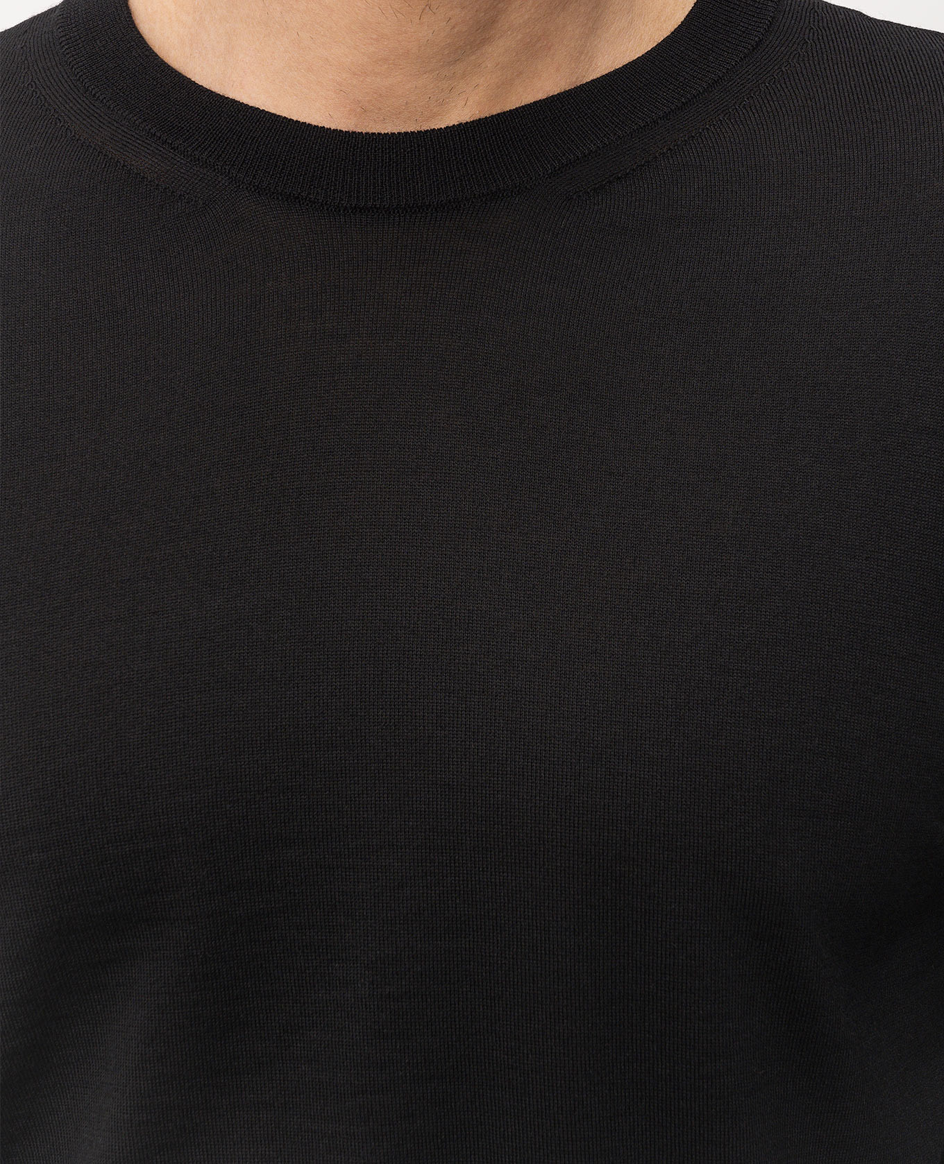 

Black wool jumper with embroidered emblem Valentino