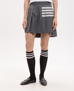 Thom Browne Gray pleated wool skirt with branded stripes FGC402V06146
