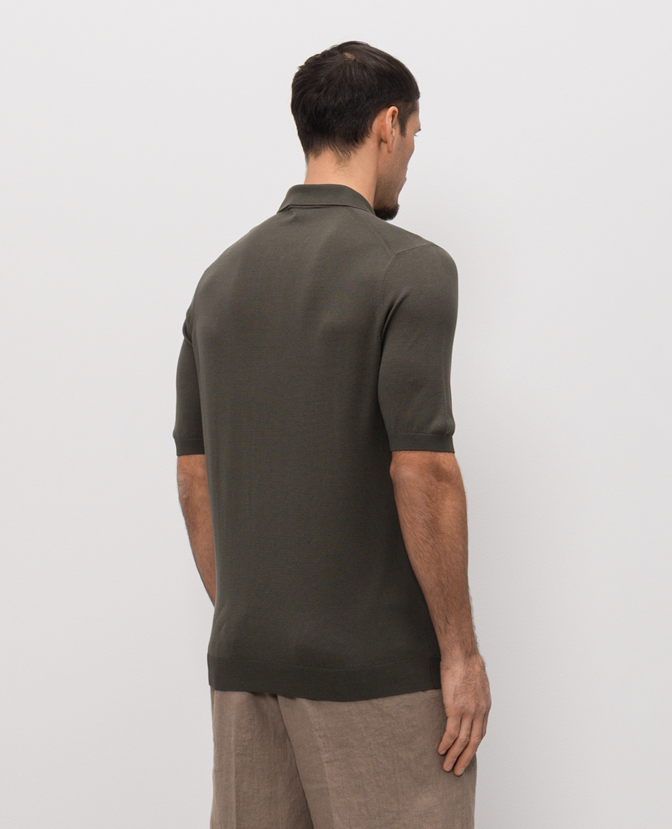 

Green silk polo shirt with logo patch Enrico Mandelli