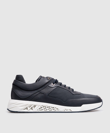 Sneakers in pelle blu con logo testurizzato
