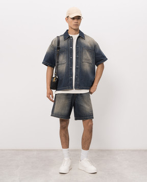 AMIRI Blue denim shorts with a distressed effect AM326SO001