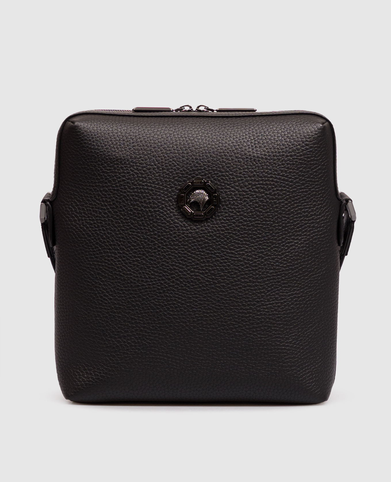 Black leather bag with metal eagle head emblem