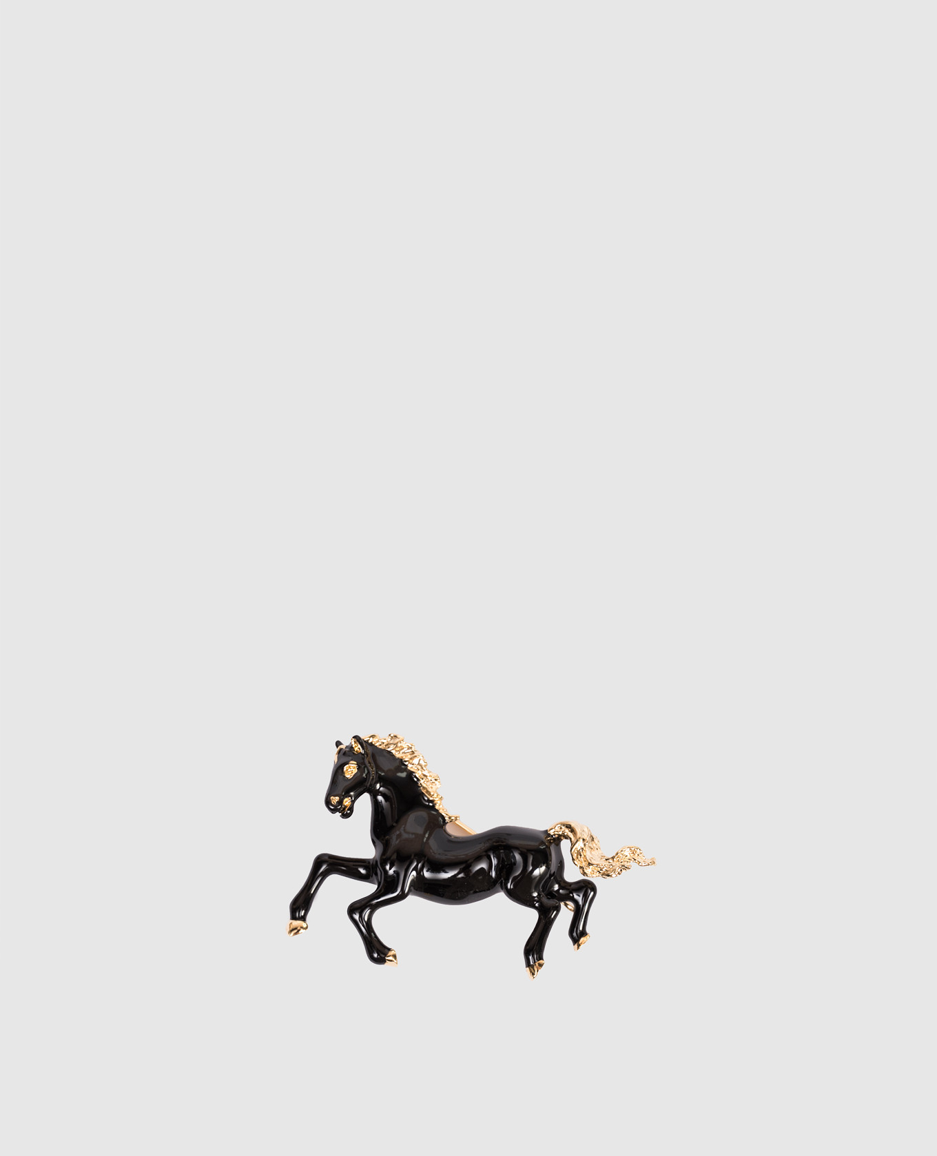 Black brooch in the shape of a horse