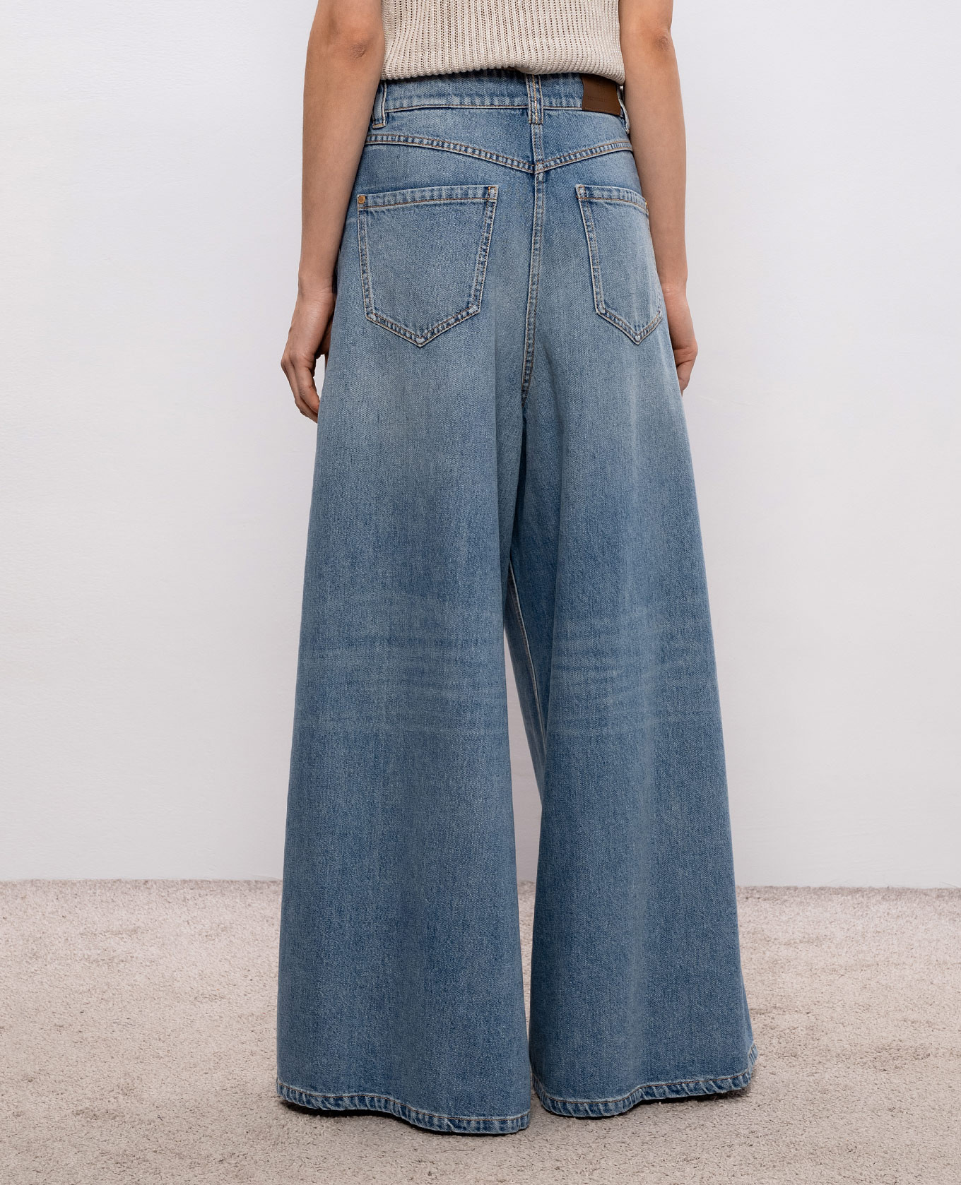 

Blue palazzo pants with logo patch Brunello Cucinelli
