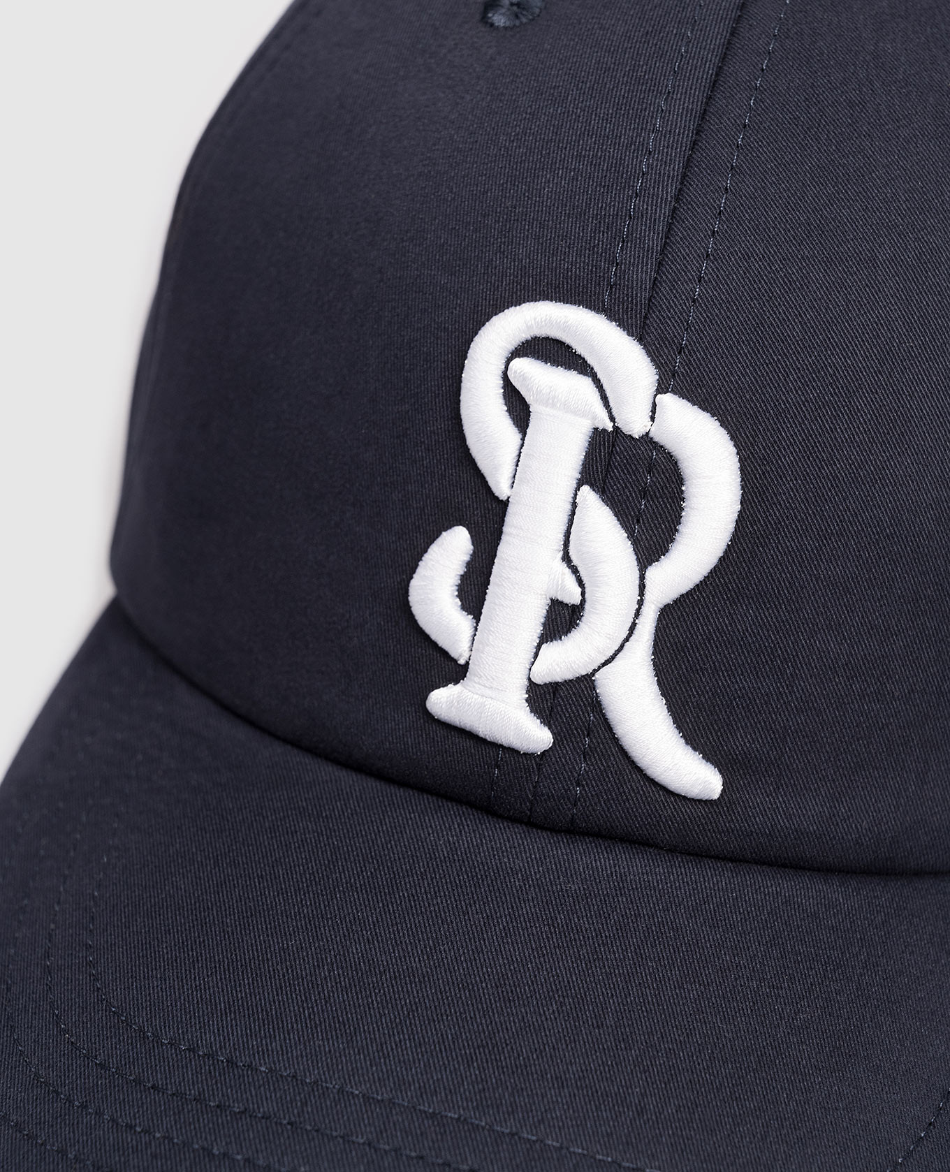 

Blue cap with contrasting logo monogram Stefano Ricci