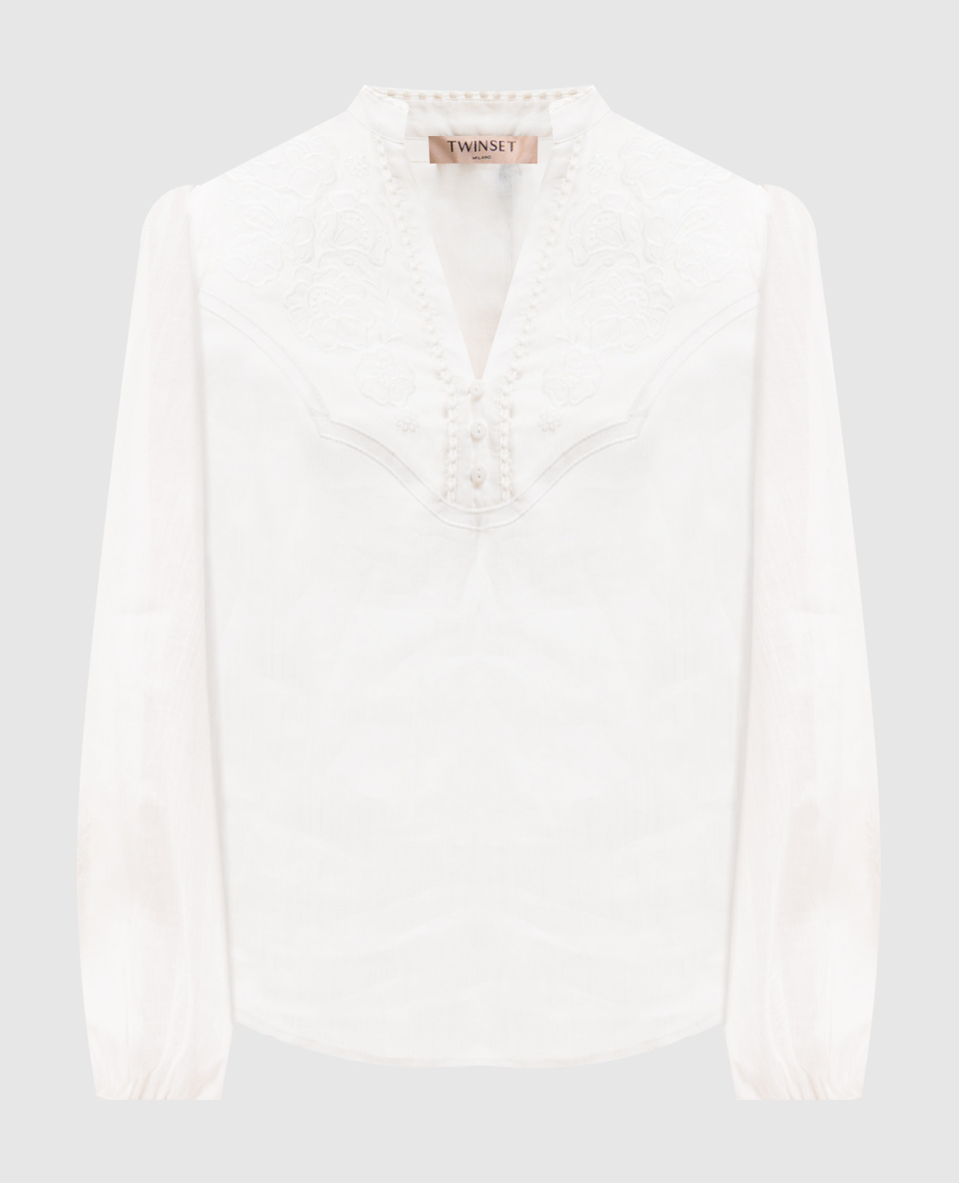 White blouse with floral embroidery