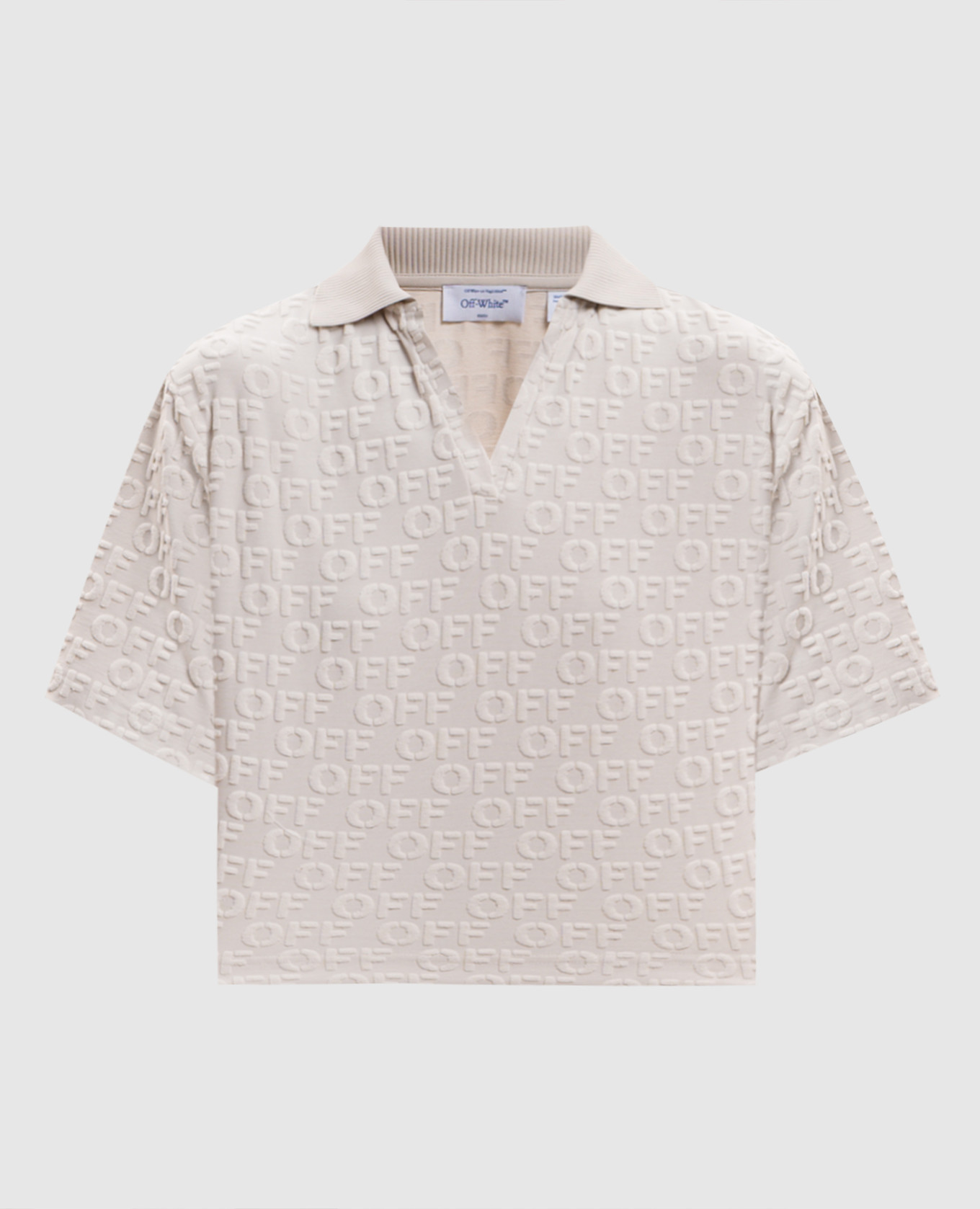 Beige poloshirt met logo-opdruk.