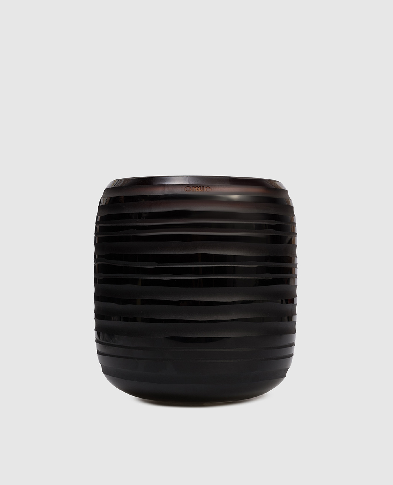 

Sphere Amber  candle with Zanzibar scent in a glass candle holder Onno, Brown