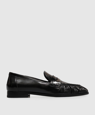 Schwarze Lederslipper
