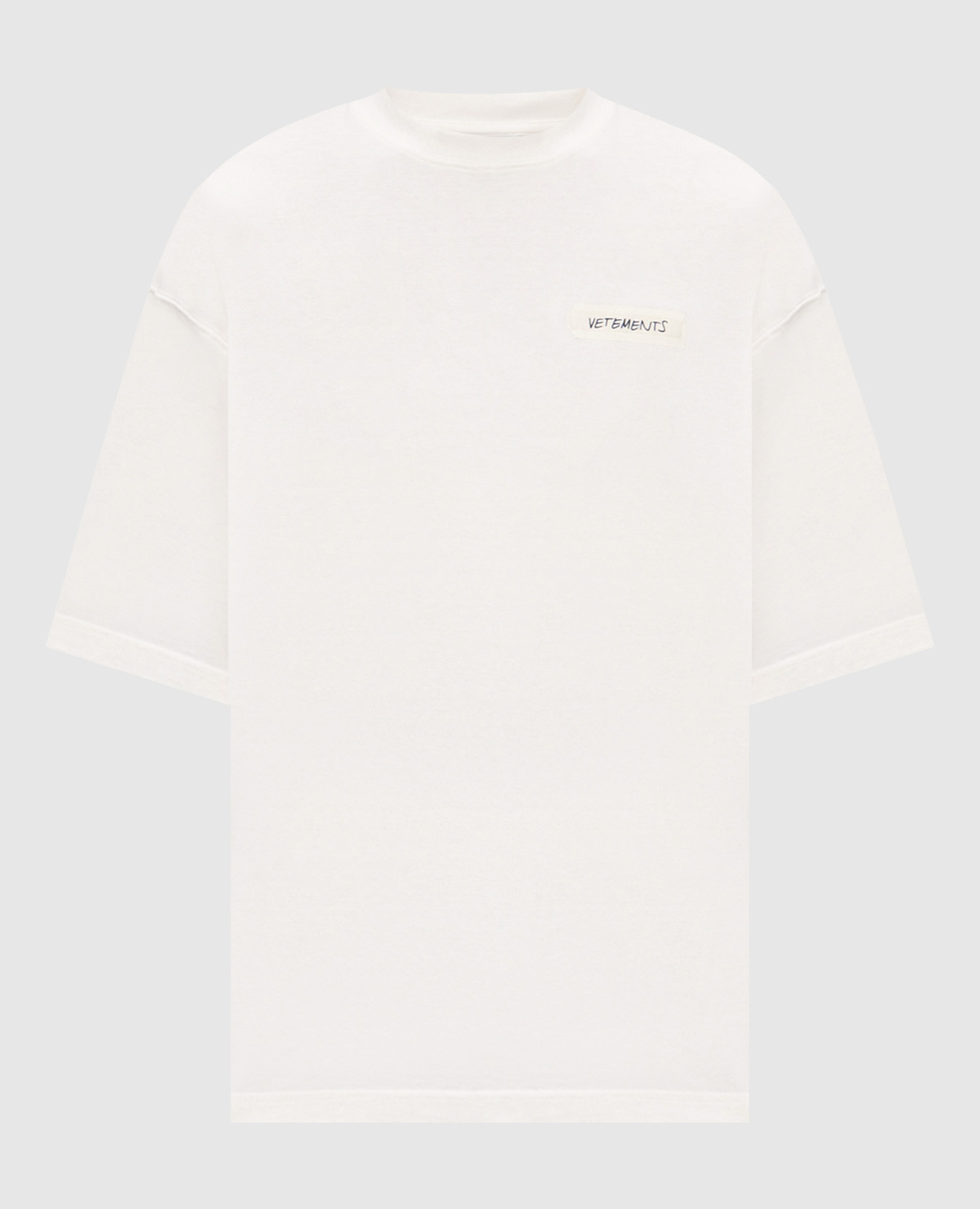 Ivory T-shirt with a print of the inscription Vetements