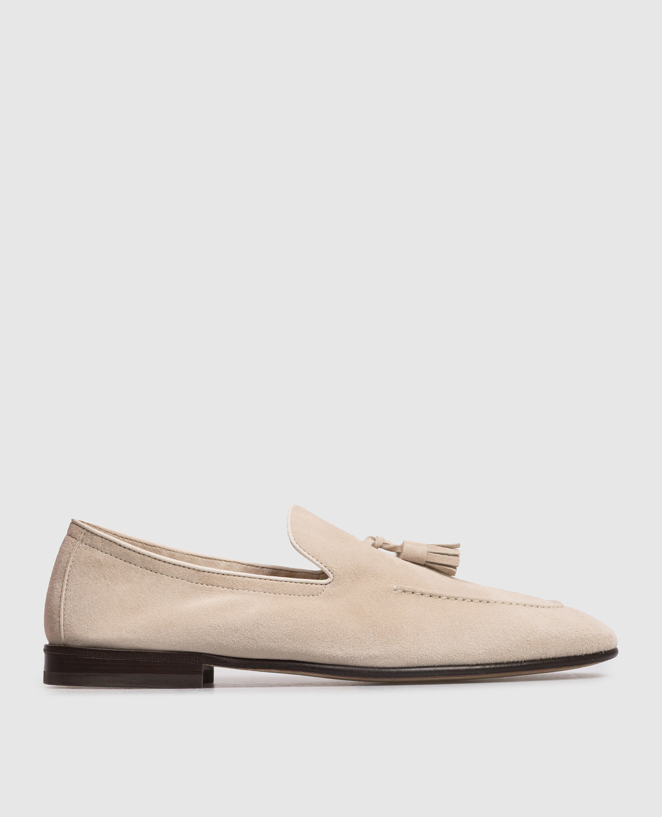 Beige suede loafers with tassels
