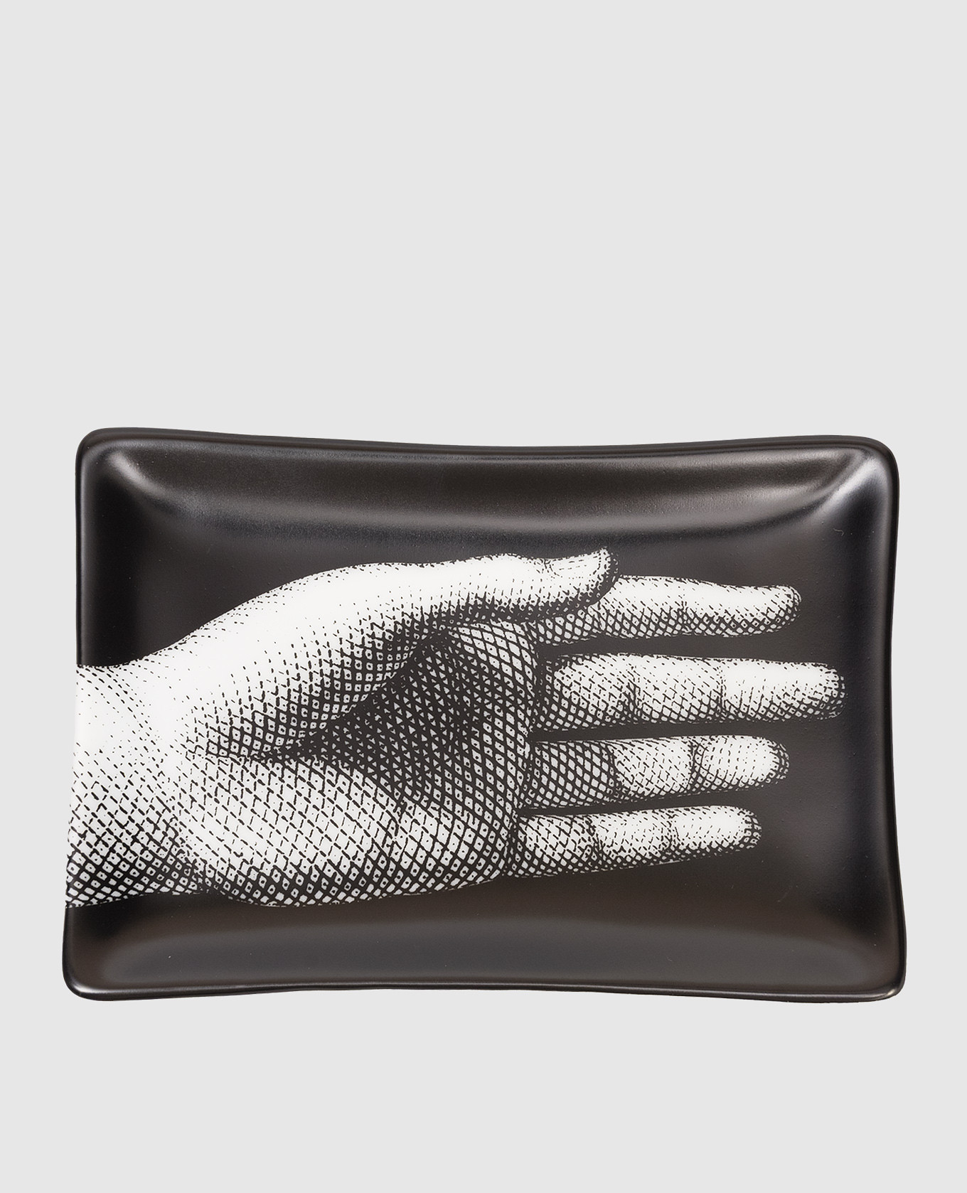 

Black porcelain ashtray Mano Fornasetti