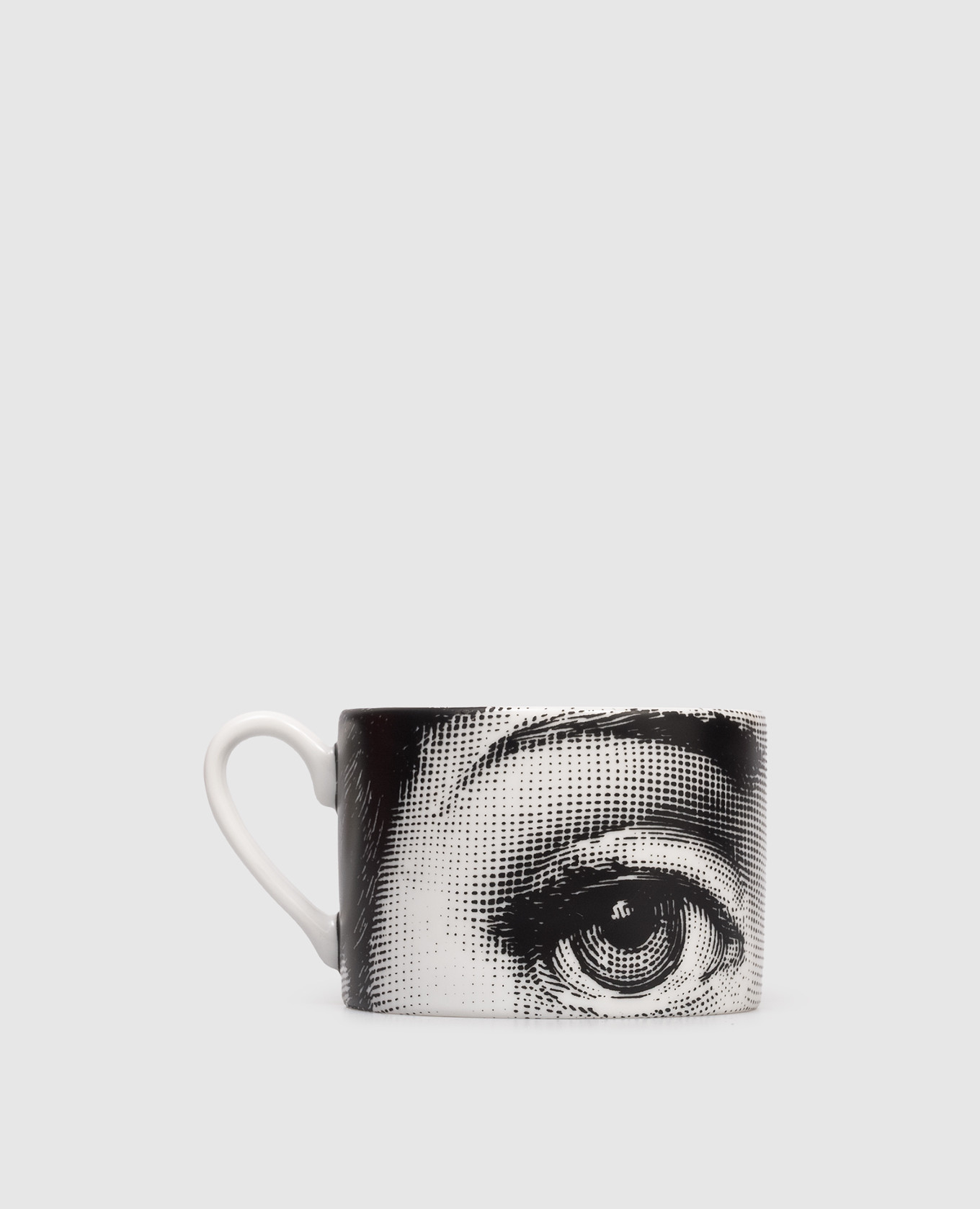 

Porcelain tea set Tema e Variazioni with cup and saucer Fornasetti, Black
