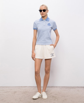 Sporty & Rich NY Crest Prep Blue Striped Polo with Embroidered Emblem TO10476243ST19