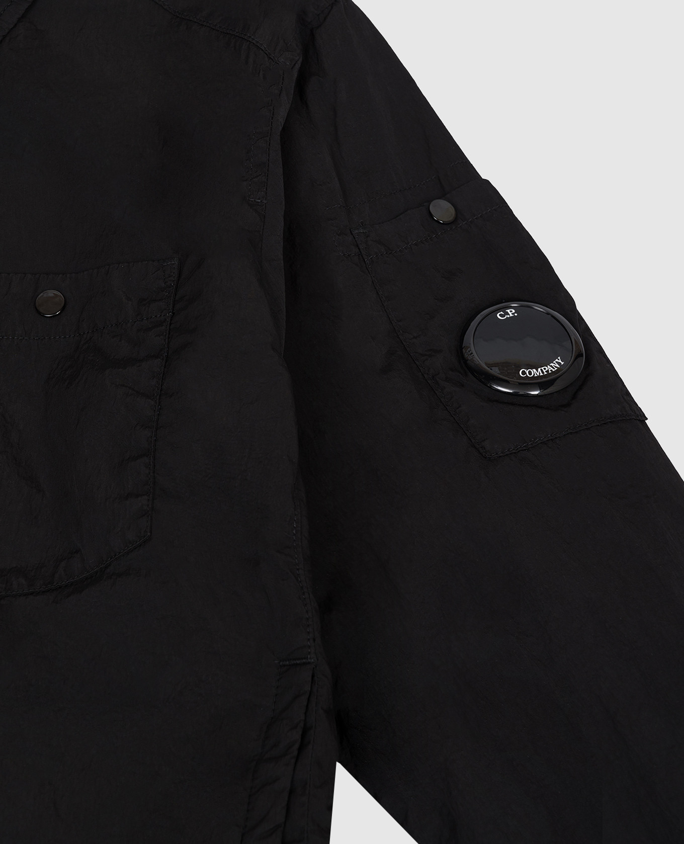 

Children's black jacket with logo patch C.P. Company