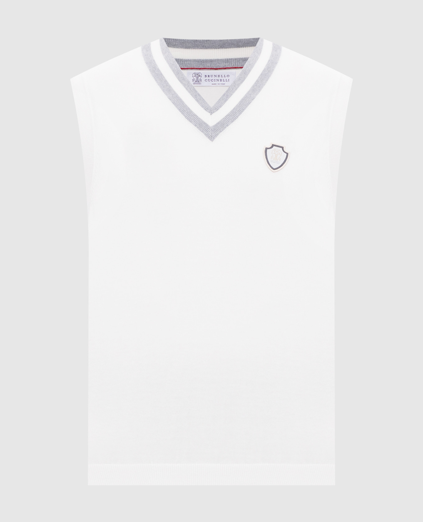 White vest with emblem patch