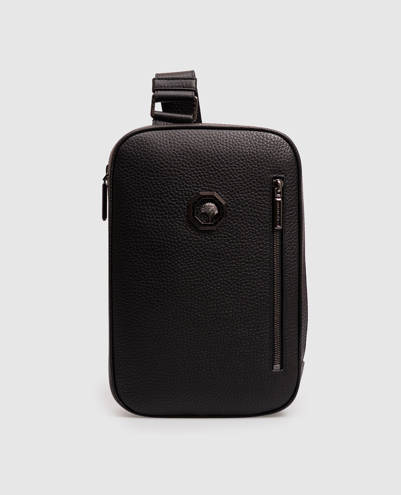 Black leather sling bag with textured emblem