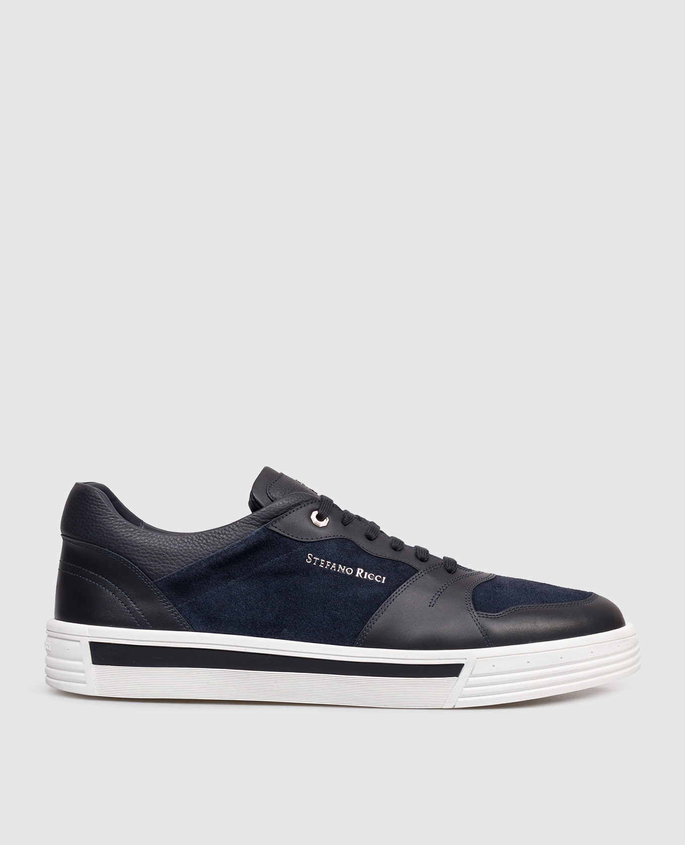 Blue leather sneakers with textured logo