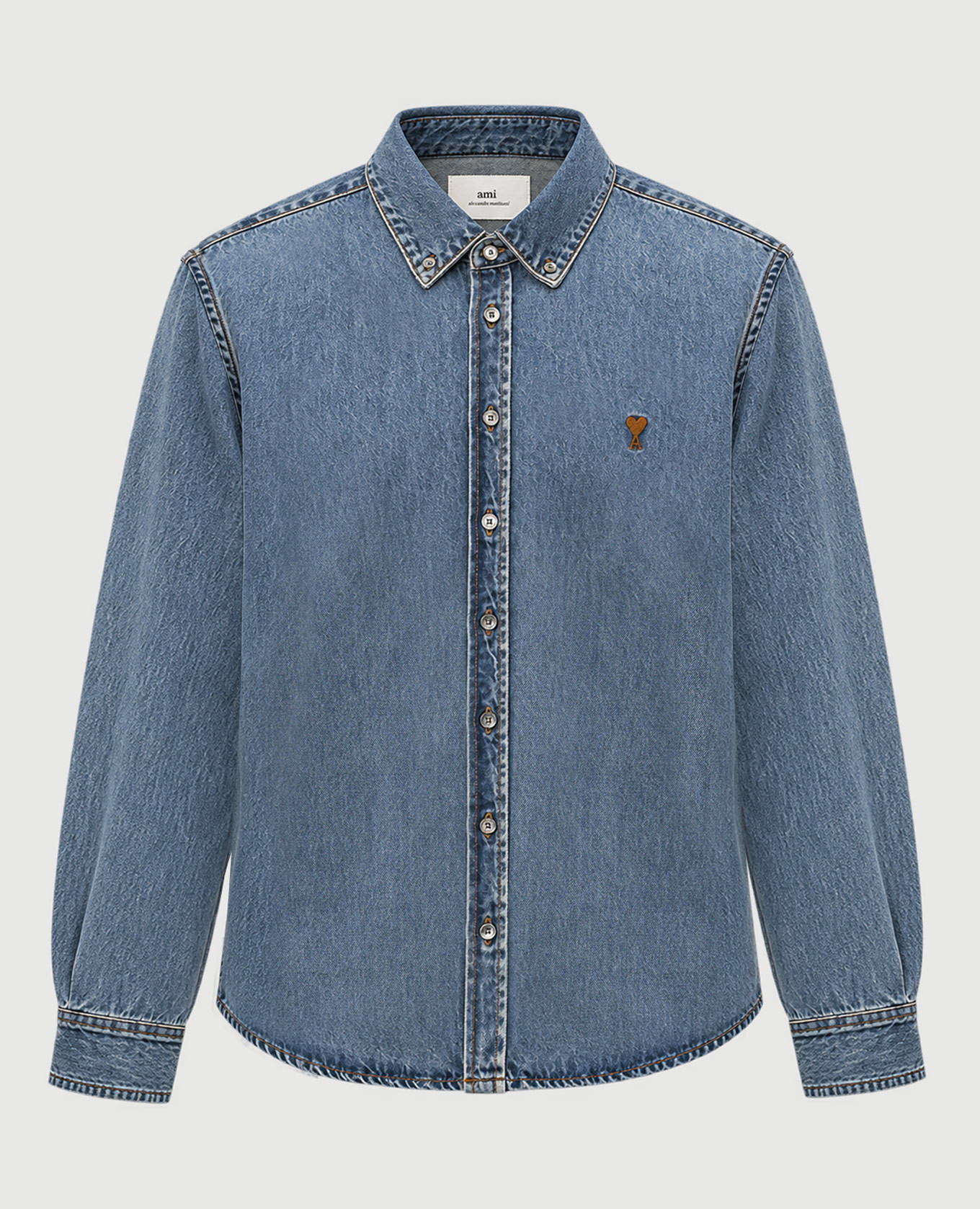 Blue denim shirt with embroidered emblem