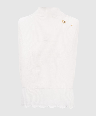 Ivory vest with brooch