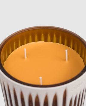 Onno Akosua S candle with Sunset scent in a glass candle holder ON600ST