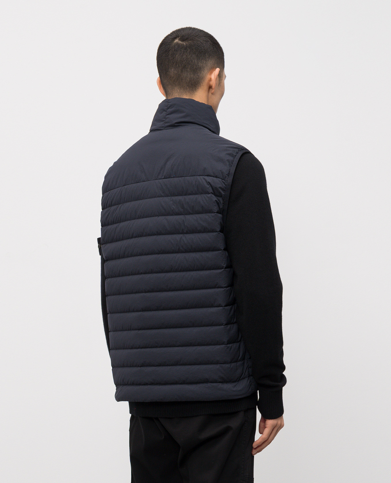 

Blue down vest with logo patch Stone Island