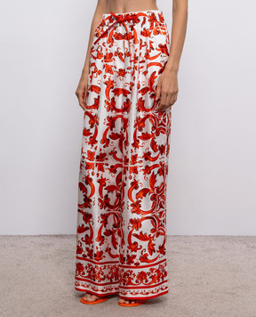 Dolce&Gabbana White silk pants with branded print FTDBNTGDDRE