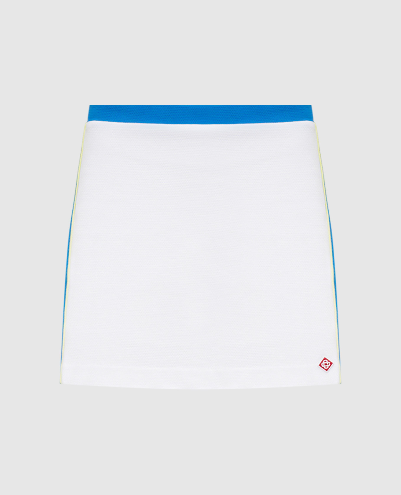 Jupe blanche avec un écusson