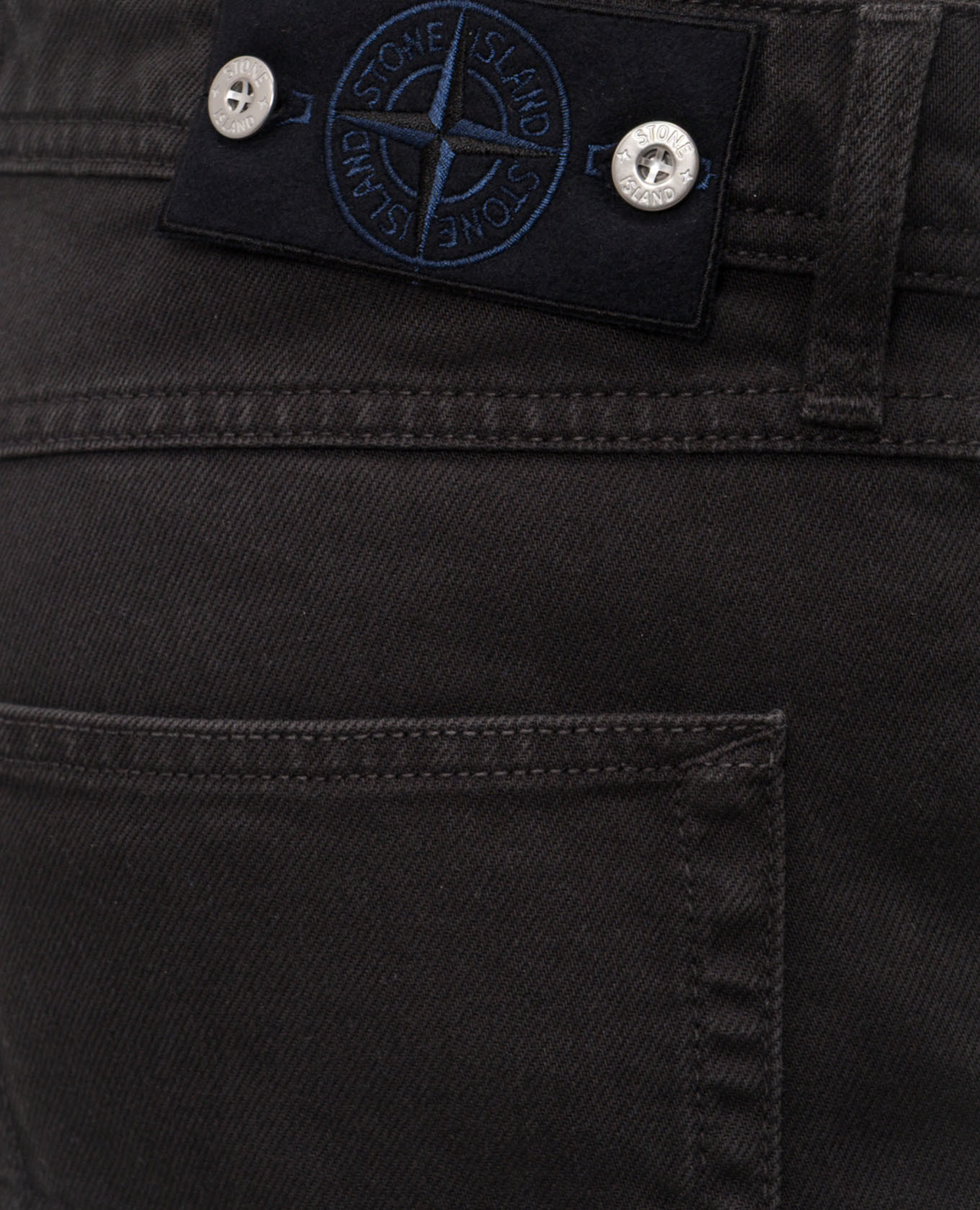 

Black jeans with logo patch Stone Island
