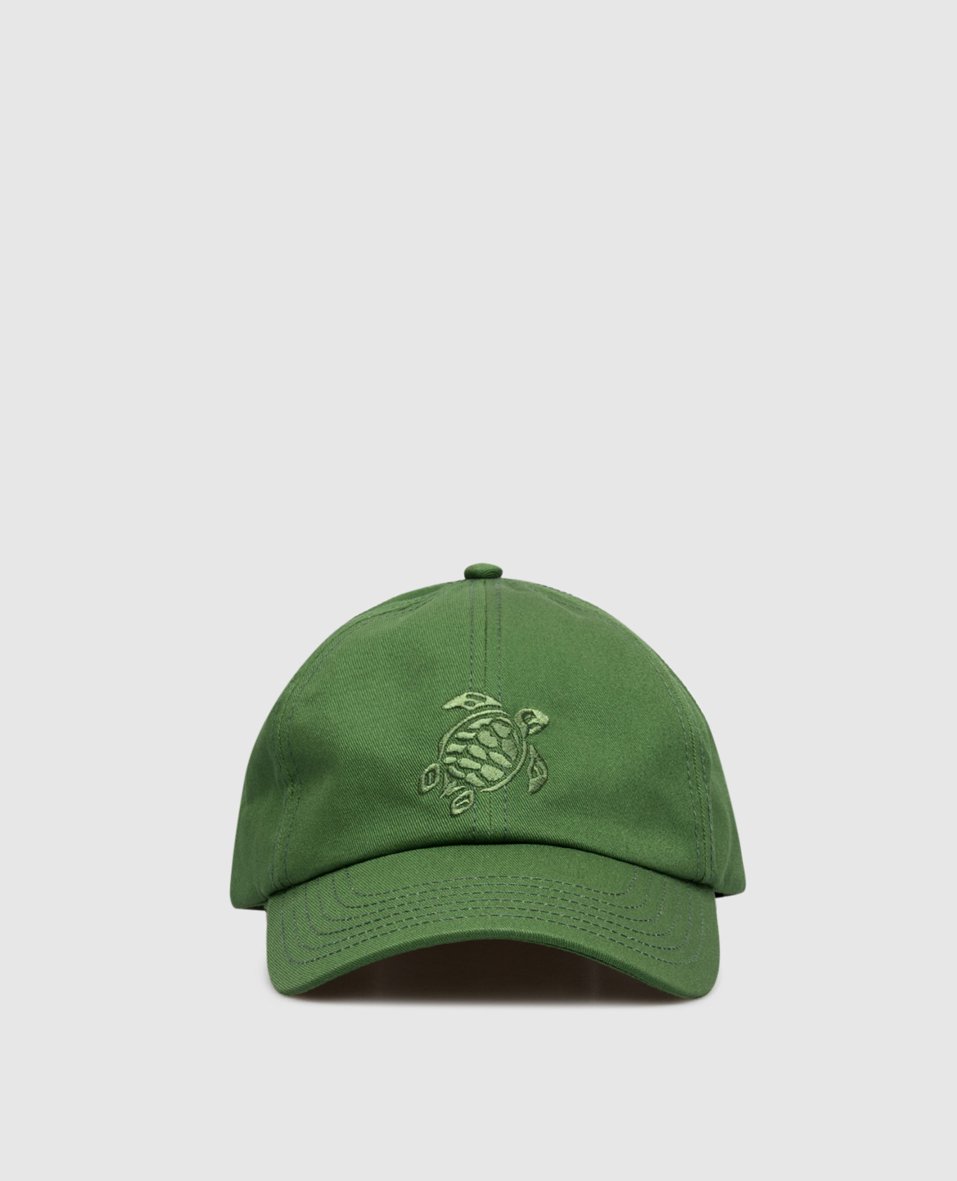 Green cap with emblem