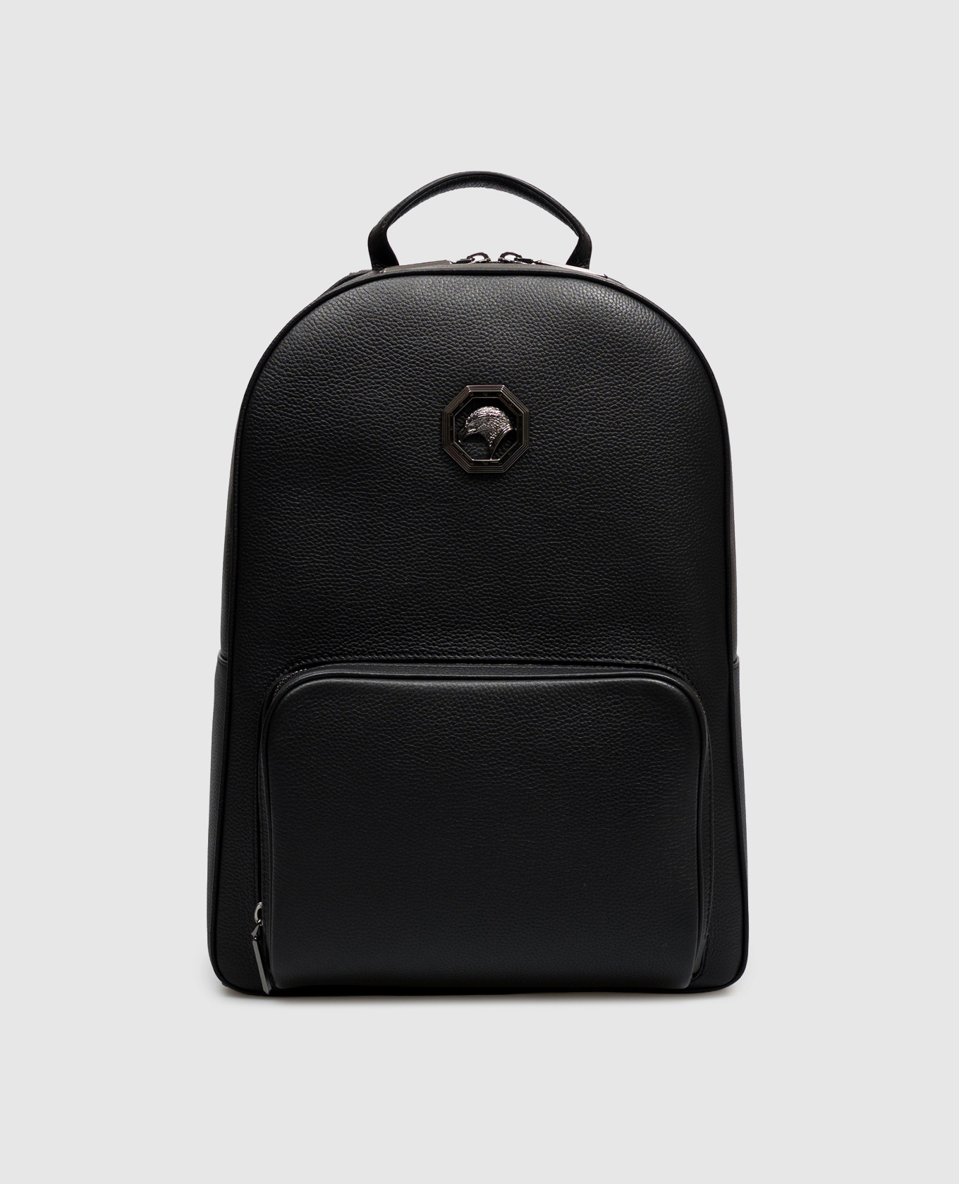 Black leather backpack with textured emblem