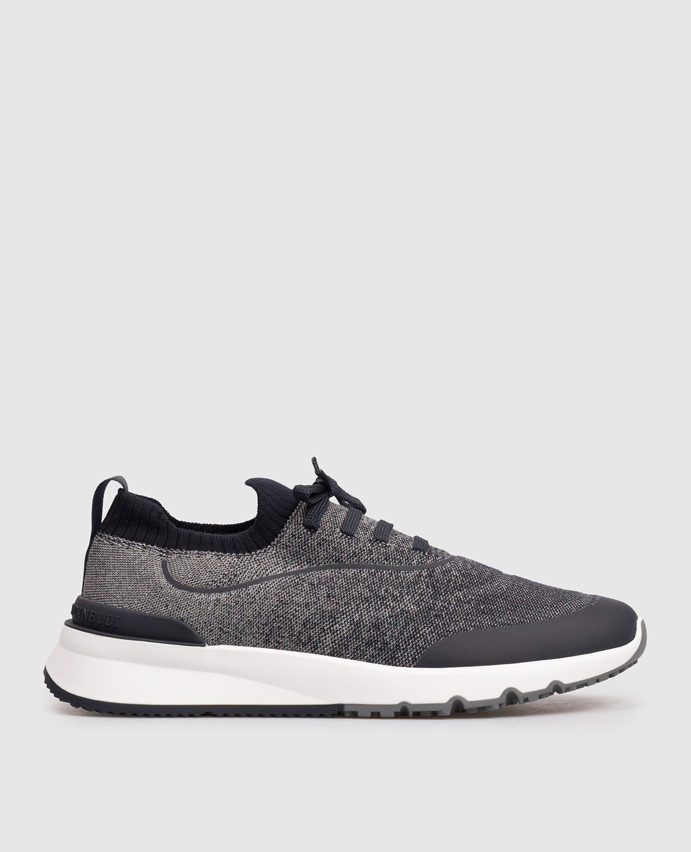 Blue sneakers with textured logo